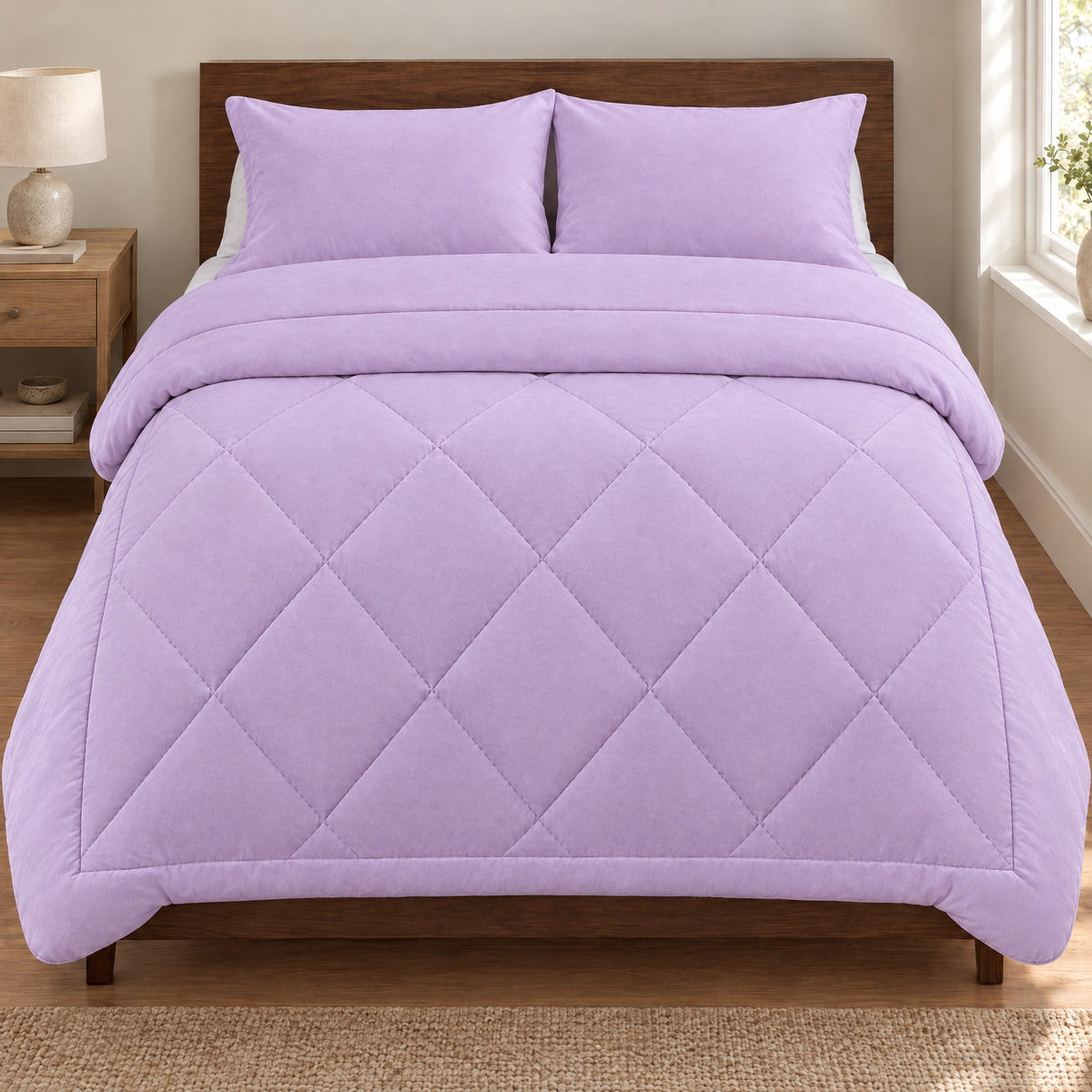 Duvenna Coverless Duvet in Lavender Mist on a double bed with matching pillowcases Image