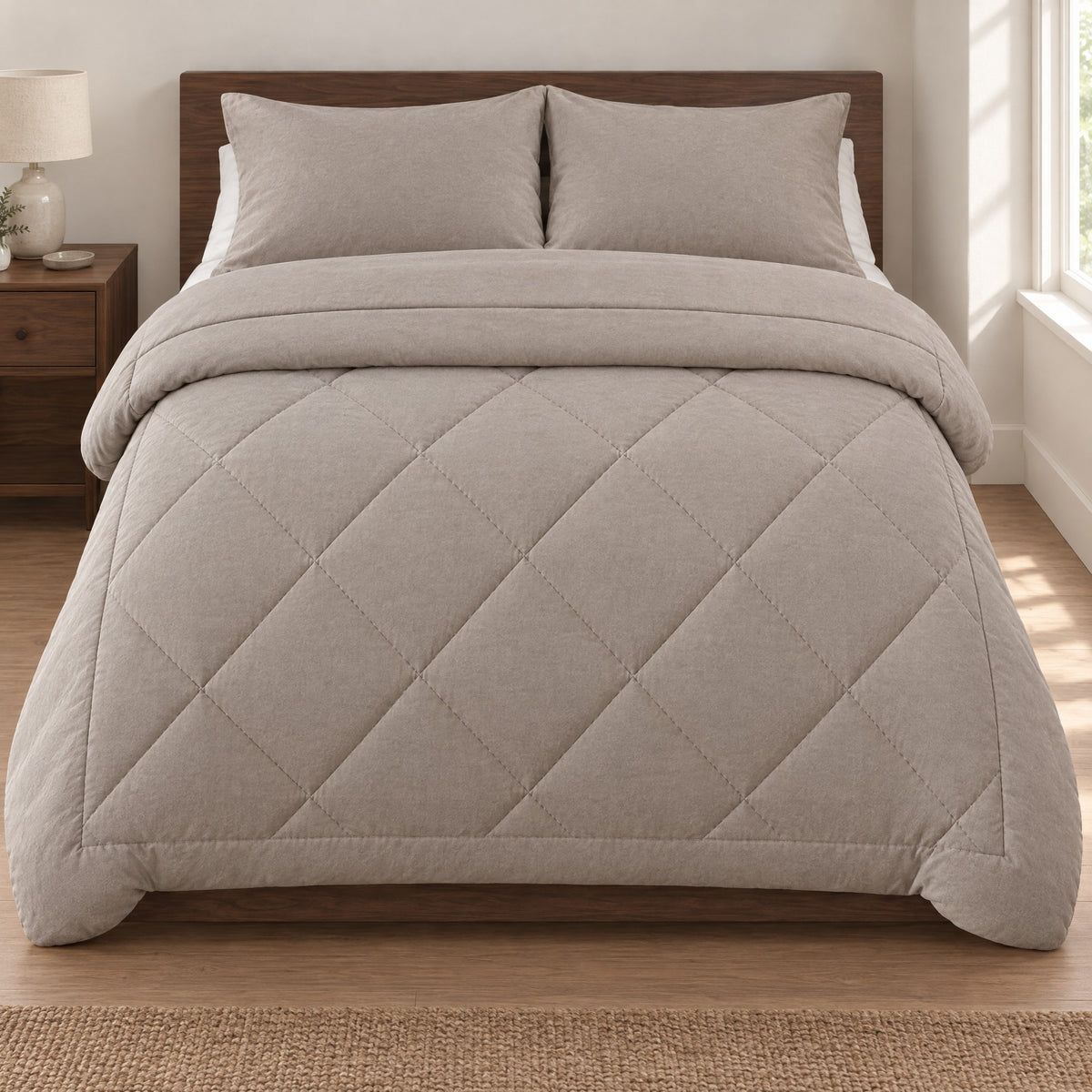 Duvenna coverless duvet in Stone Grey on a walnut bed with matching pillowcases Image