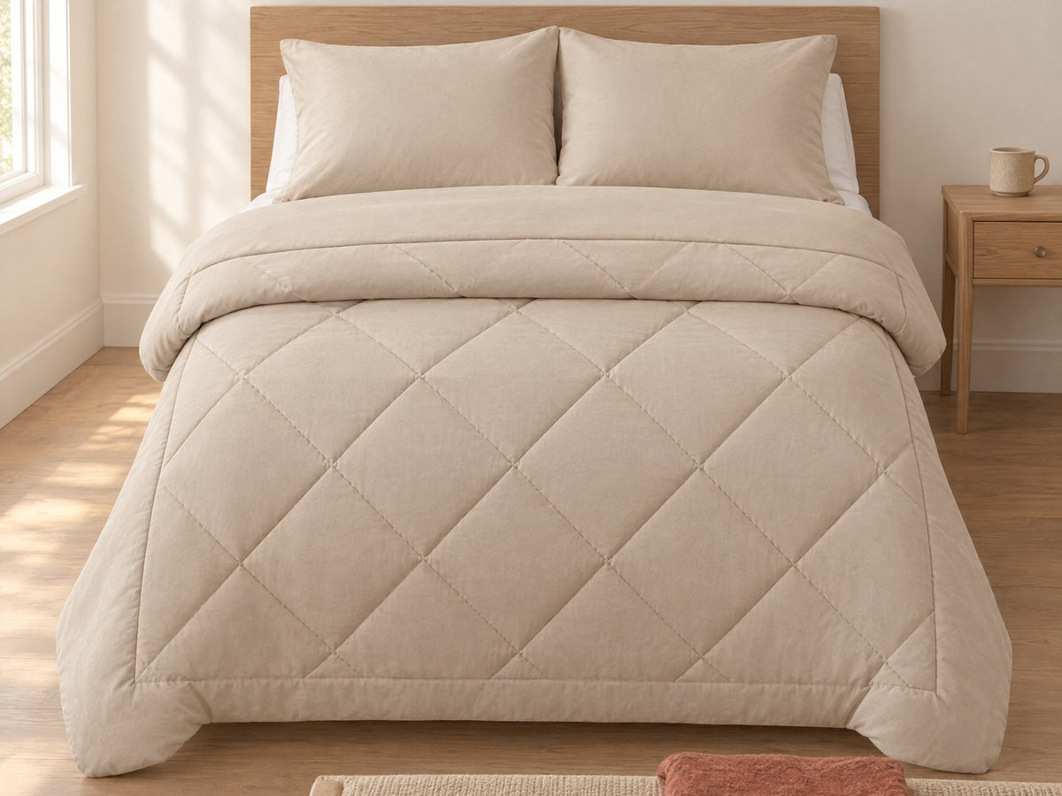 Duvenna coverless duvet in Cream on a bed with an oak headboard, morning light Image